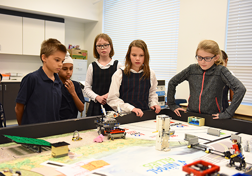 Lower School robotics students preparing for the Animal Allies competition.