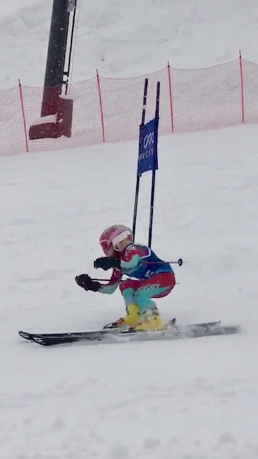 Ellie competes in the Park City Youth Ski League.