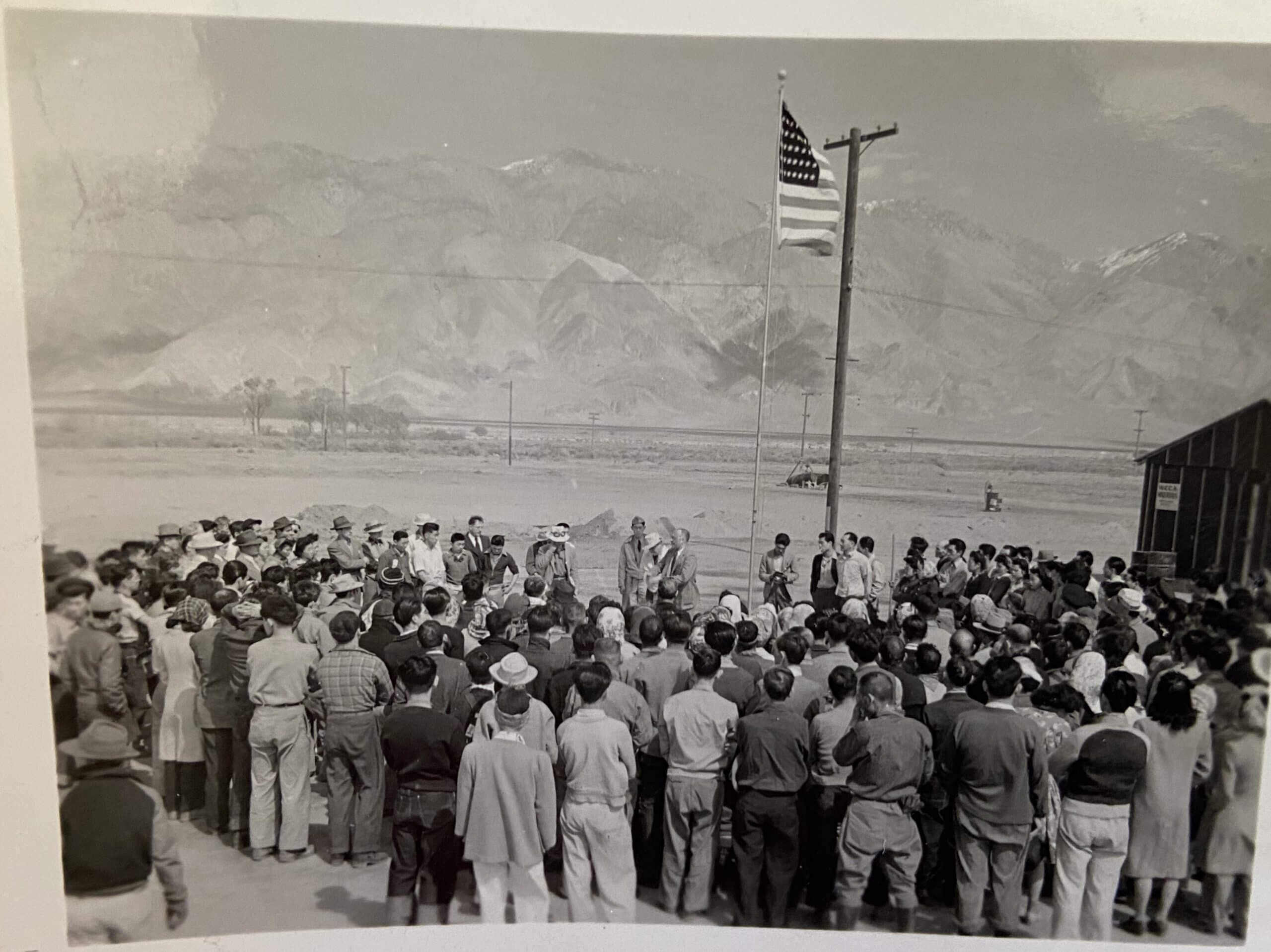 Unknown situation from Hisa’s Manzanar album. Some sort of gathering around the
American Flag.